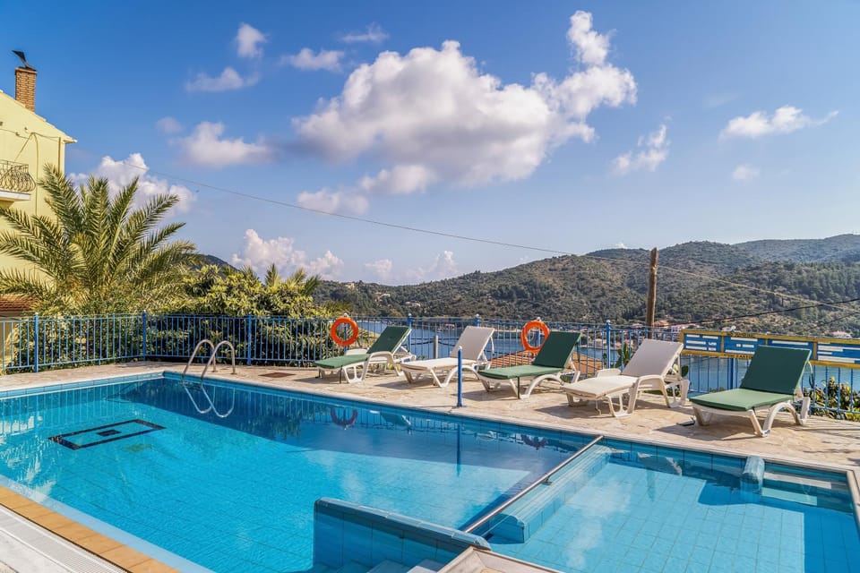 Property building, Living room, Swimming pool