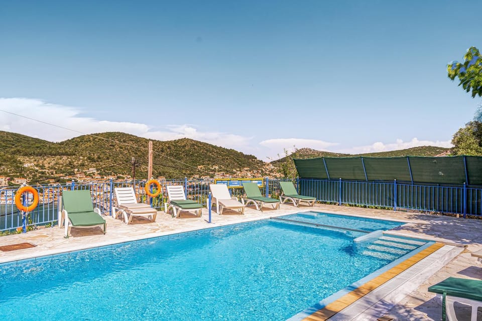 Property building, Living room, Swimming pool