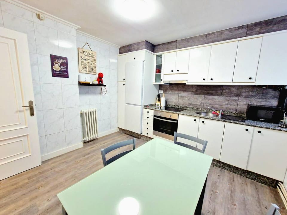 Kitchen or kitchenette, oven, stove