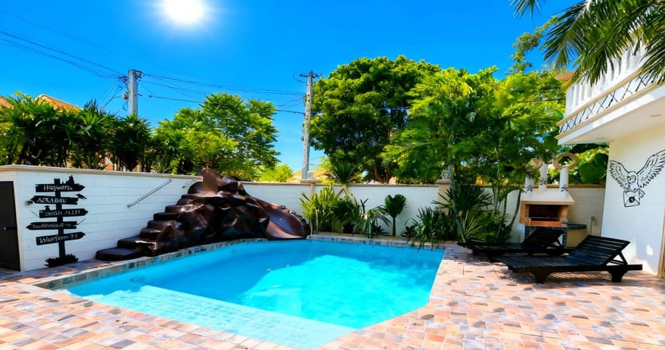 Property building, Patio, Nearby landmark, Communal lounge/ TV room, Garden, Evening entertainment, Garden view, Pool view, Swimming pool, sunbed