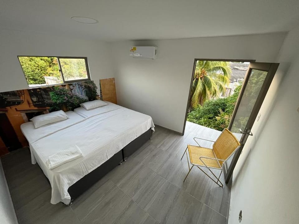 Bed, Photo of the whole room, Bedroom, towels, air conditioner