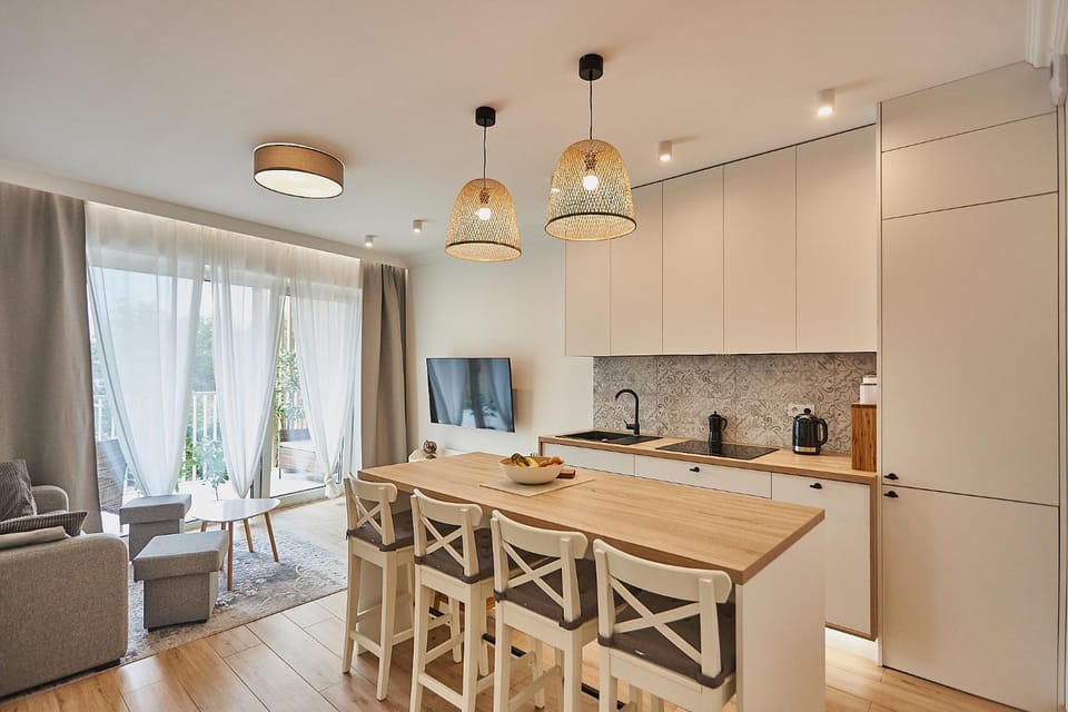 Kitchen or kitchenette, Living room, Seating area, Dining area