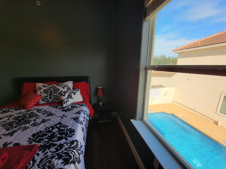 Bed, View (from property/room), Bedroom, Pool view, Swimming pool