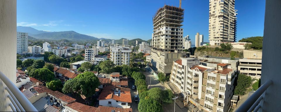 Property building, Nearby landmark, Day, Natural landscape, City view, Mountain view