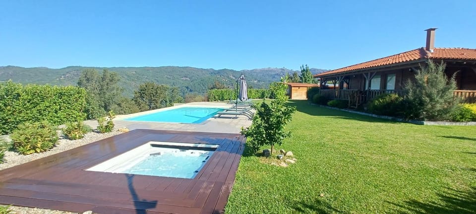 Property building, Day, Natural landscape, Garden, Hot Tub, Garden view, Mountain view, sunbed