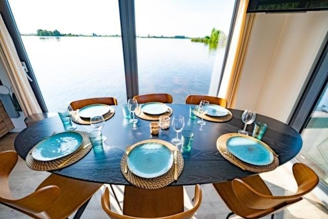 Living room, Seating area, Dining area, Lake view