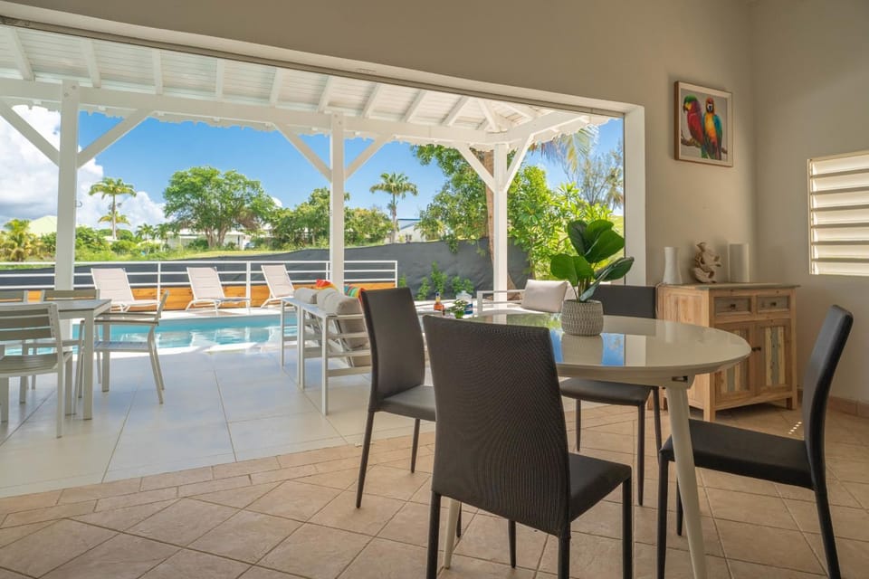 Patio, Day, View (from property/room), Balcony/Terrace, Living room, Seating area, Dining area, Pool view, Swimming pool