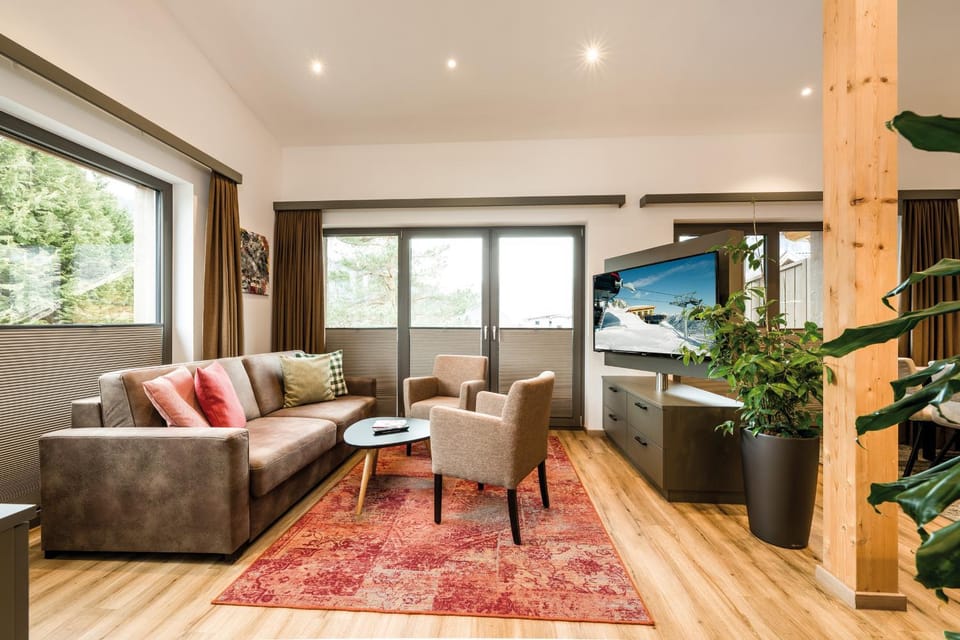 TV and multimedia, View (from property/room), Living room, Seating area, Landmark view