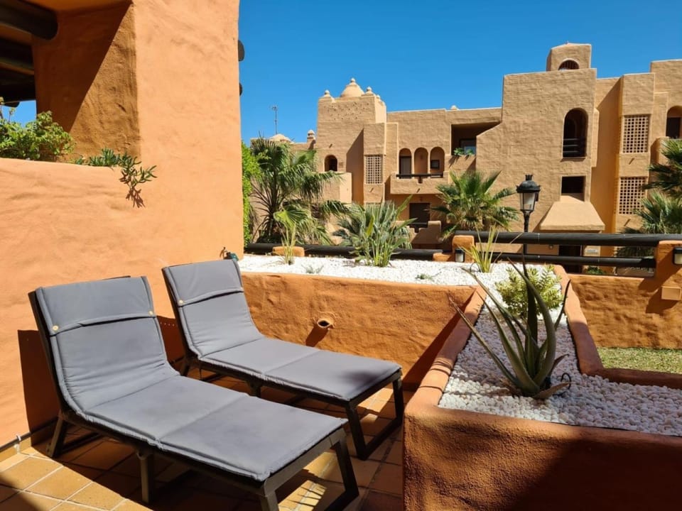 Property building, Living room, Swimming pool