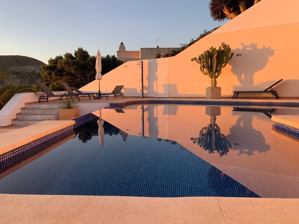 Property building, Living room, Swimming pool