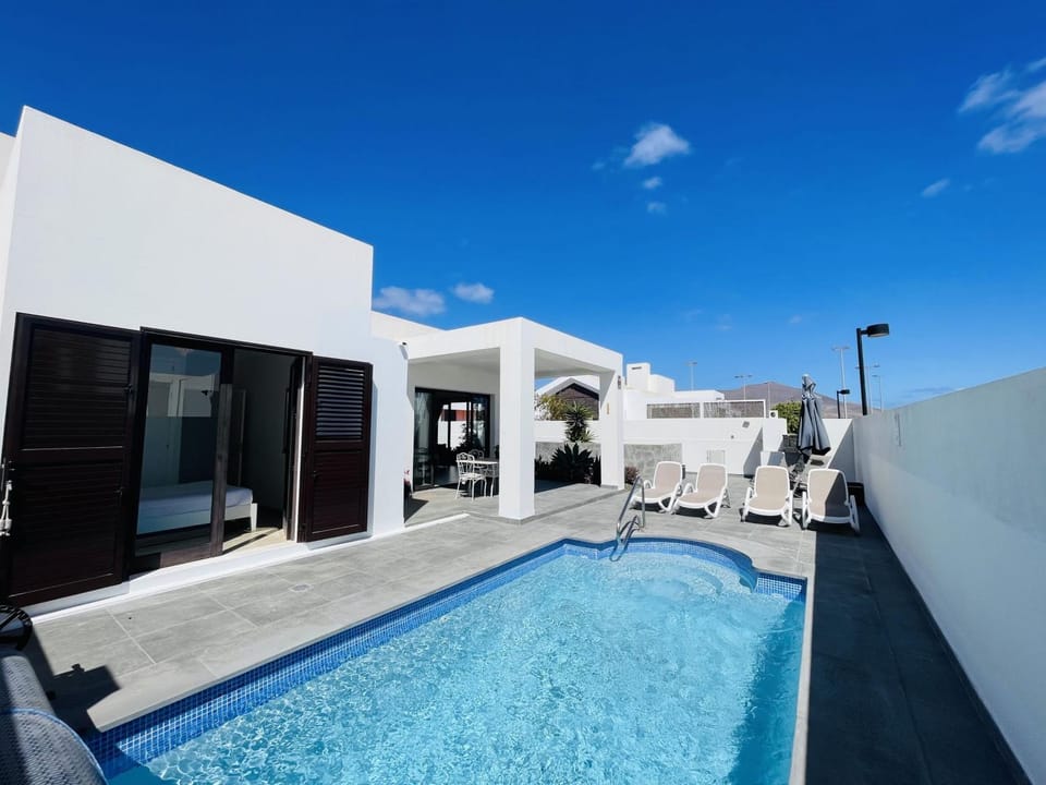 Property building, Living room, Swimming pool