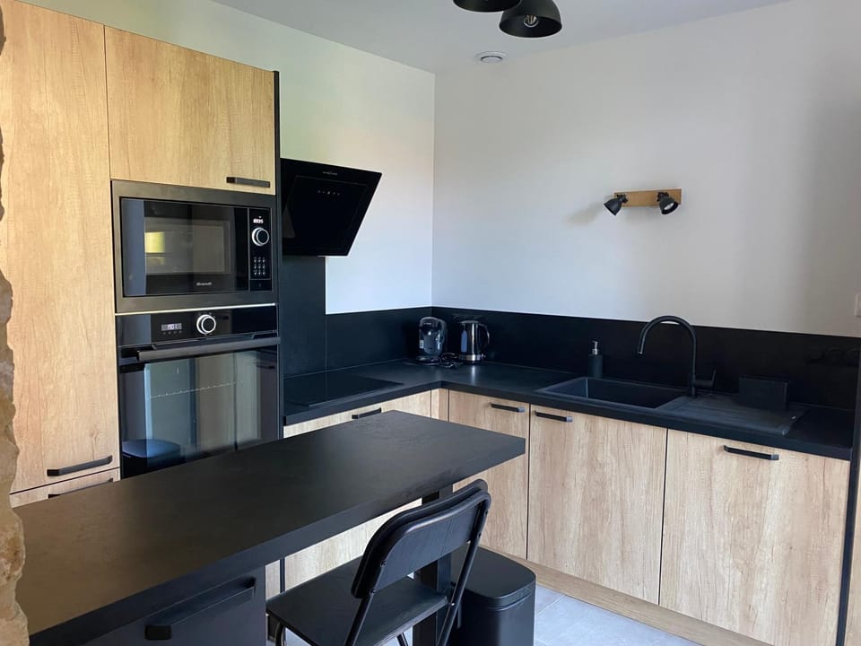 Kitchen or kitchenette, Dining area, dishwasher, oven, stove, toaster