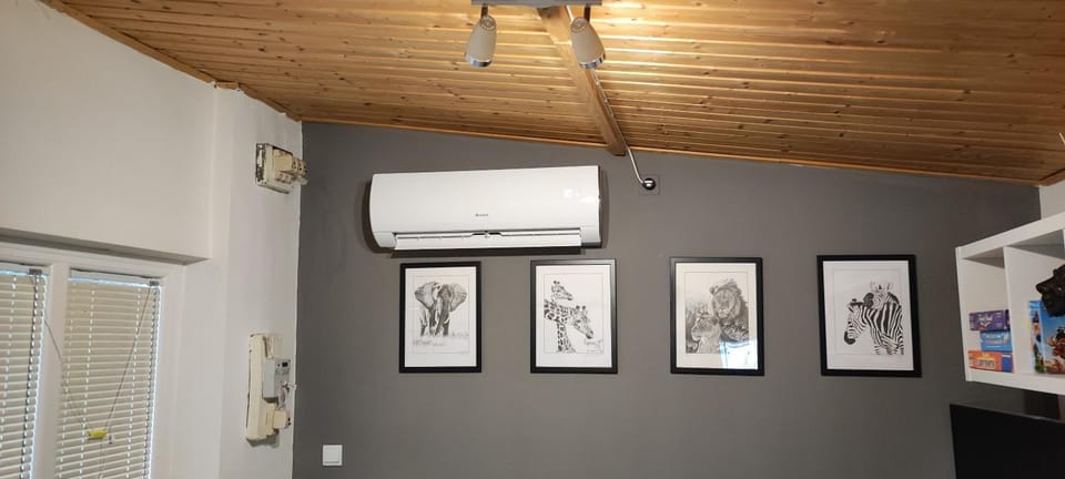 Property building, air conditioner, air conditioner
