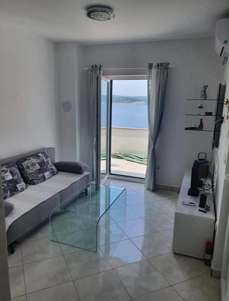 Bed, Living room, Seating area, Sea view