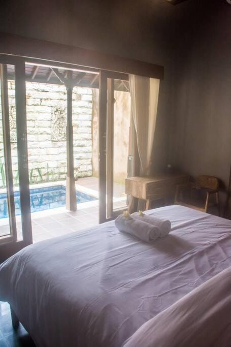 Bed, Bedroom, Pool view, Swimming pool