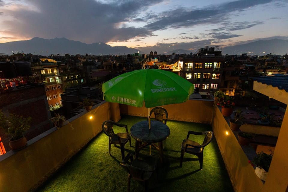 Property building, Patio, Night, Natural landscape, Balcony/Terrace, Mountain view, Sunset