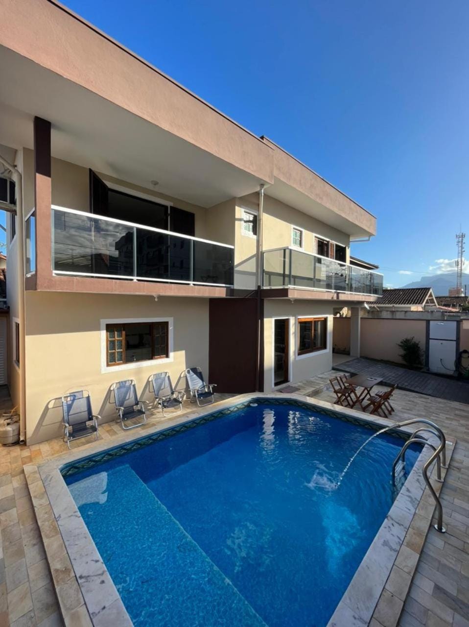 Property building, Patio, Balcony/Terrace, Pool view, Swimming pool