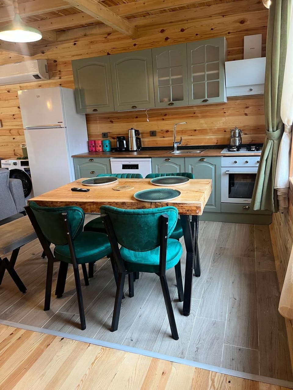 Kitchen or kitchenette, dishwasher, oven, stove, air conditioner
