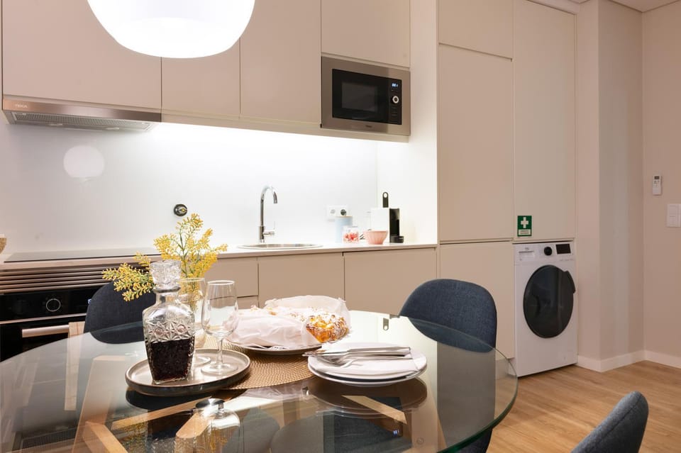 Kitchen or kitchenette, Living room, Seating area, Dining area, oven, stove, washing machine, dryer