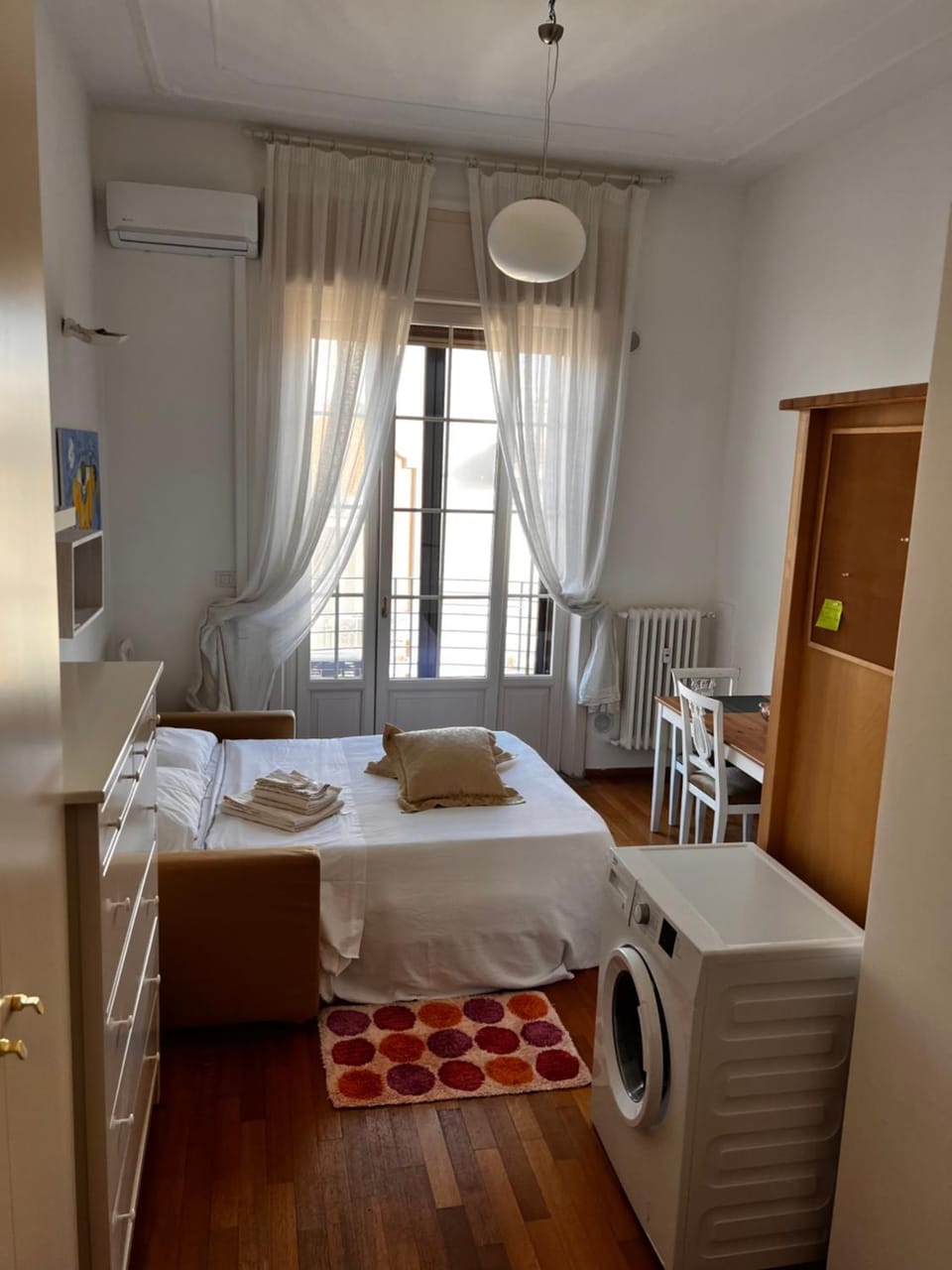 Kitchen or kitchenette, Living room, Dining area, Bedroom, towels, wardrobe, washing machine
