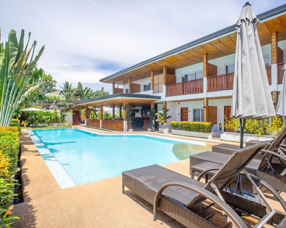 Property building, Pool view, Swimming pool, sunbed