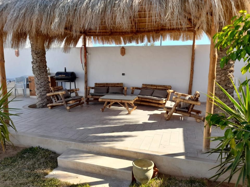 Patio, Day, BBQ facilities, Dining area