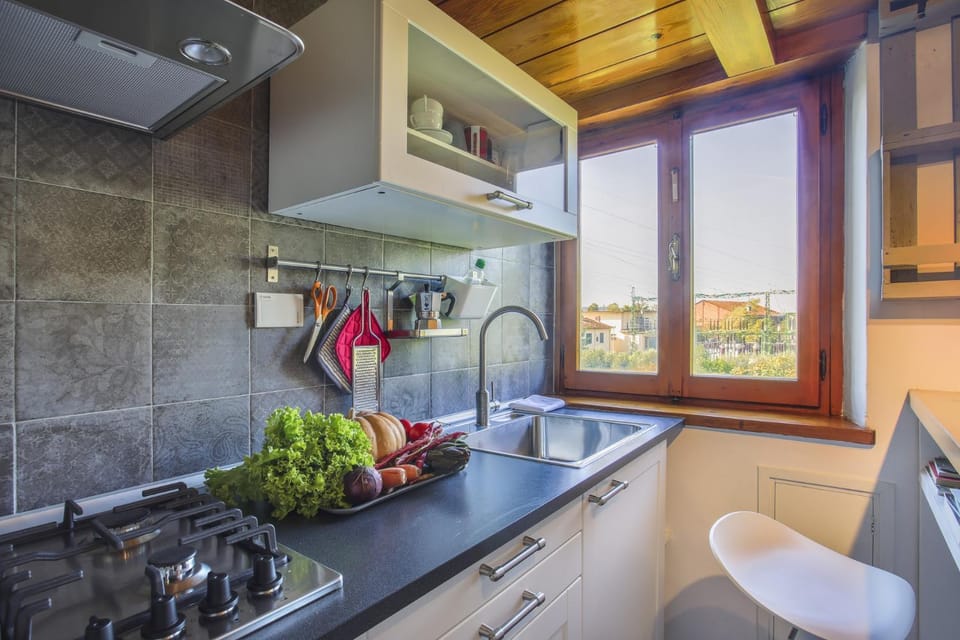 Kitchen or kitchenette, stove