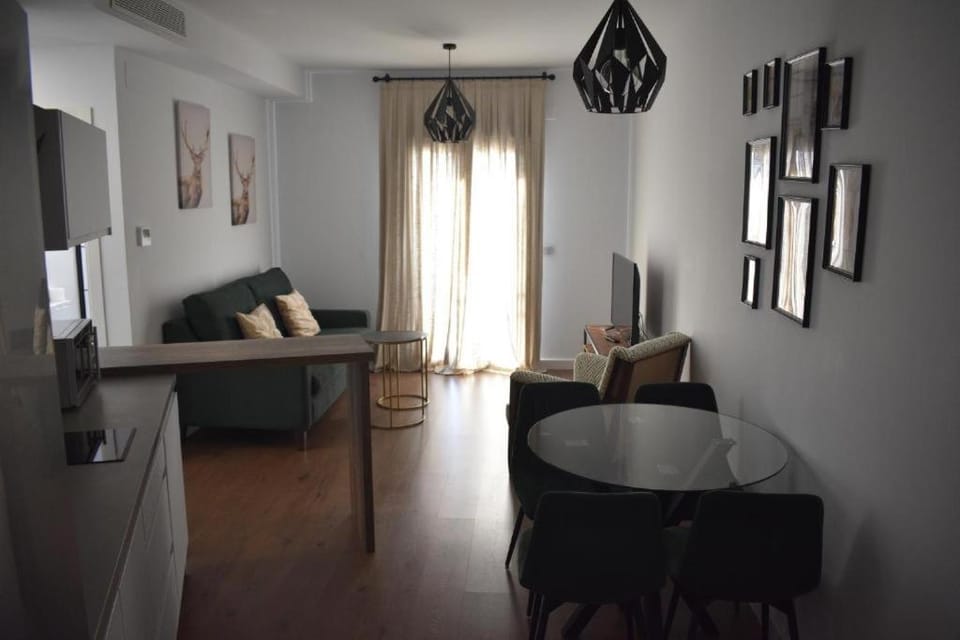 TV and multimedia, Kitchen or kitchenette, Living room, Seating area, Dining area