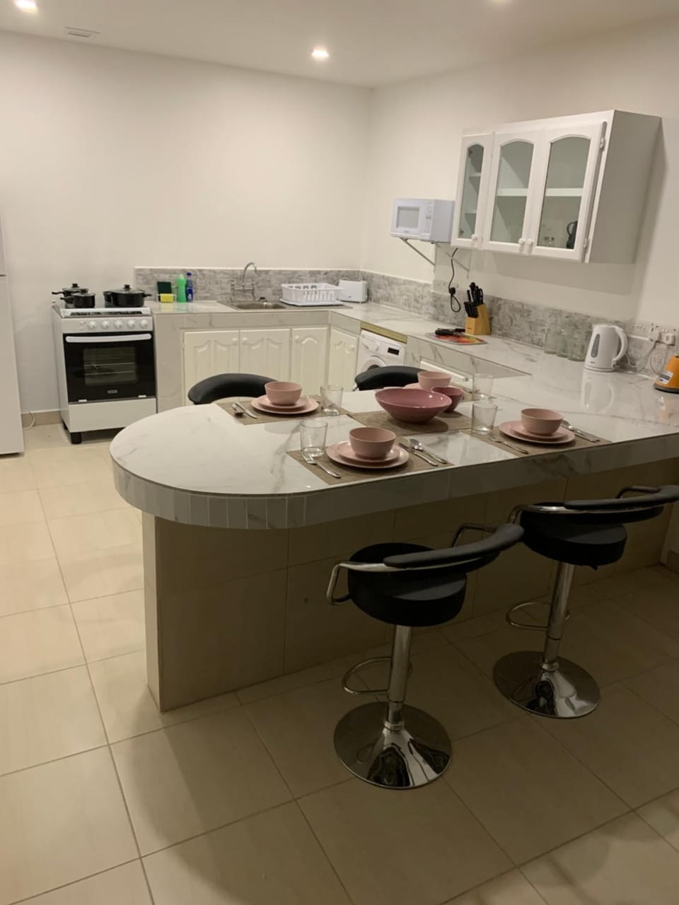 Kitchen or kitchenette, Dining area, stove, washing machine