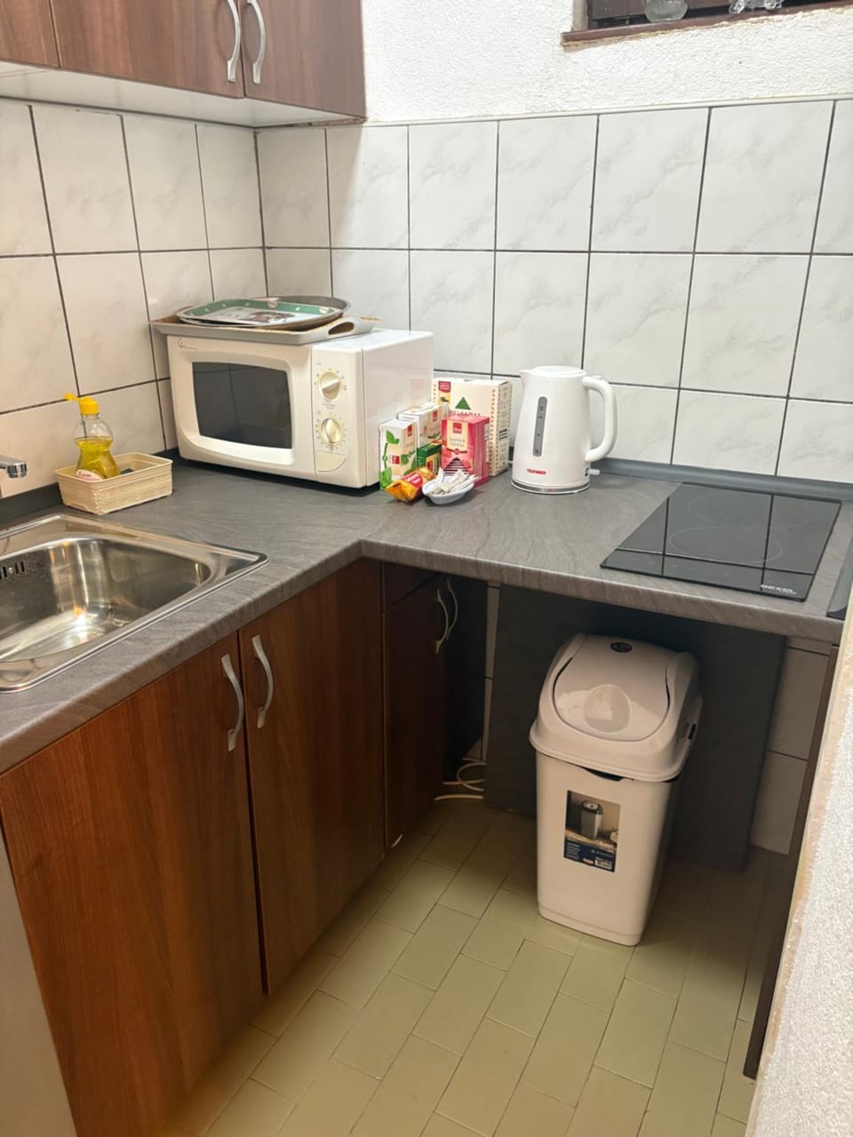 Kitchen or kitchenette, stove