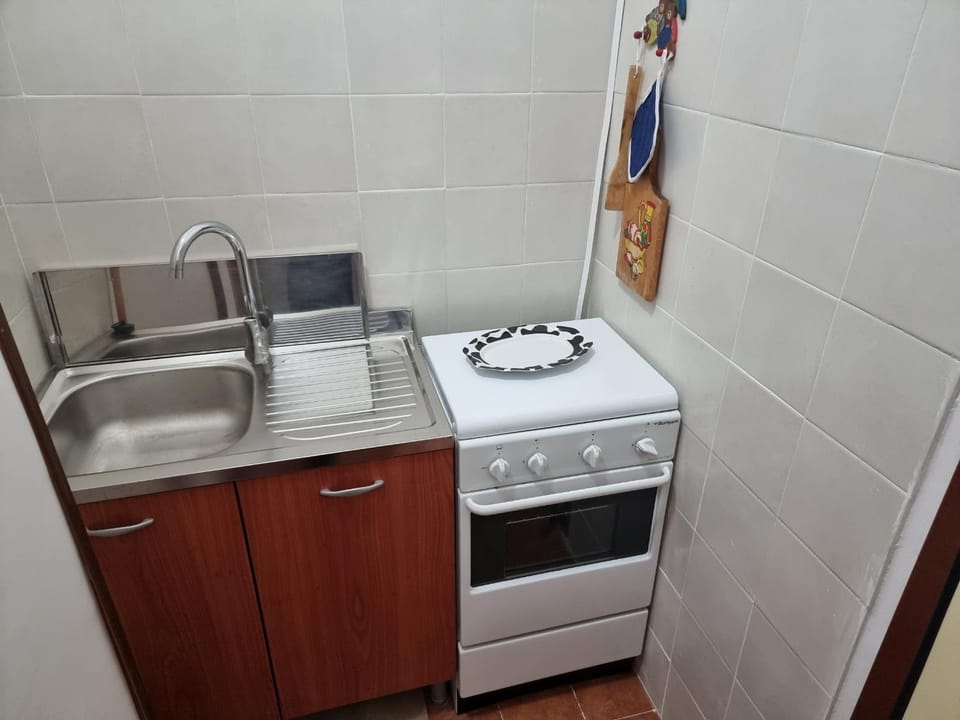 Kitchen or kitchenette, stove