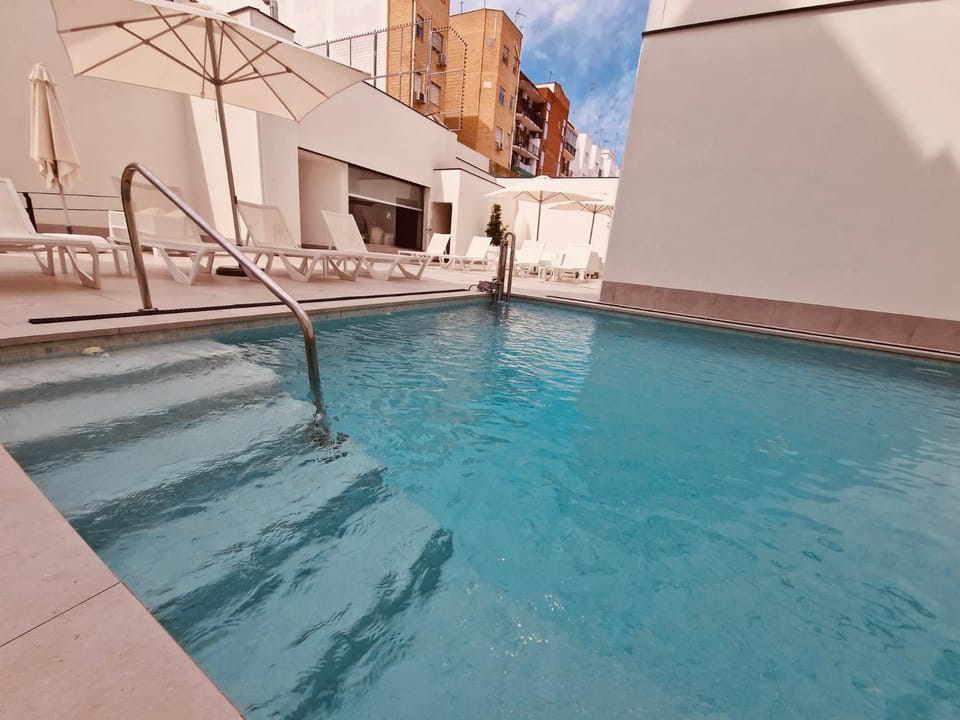 Swimming pool, sunbed
