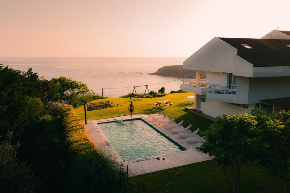 Property building, Natural landscape, Bird's eye view, Pool view, Sea view, Swimming pool, Sunrise, Sunset