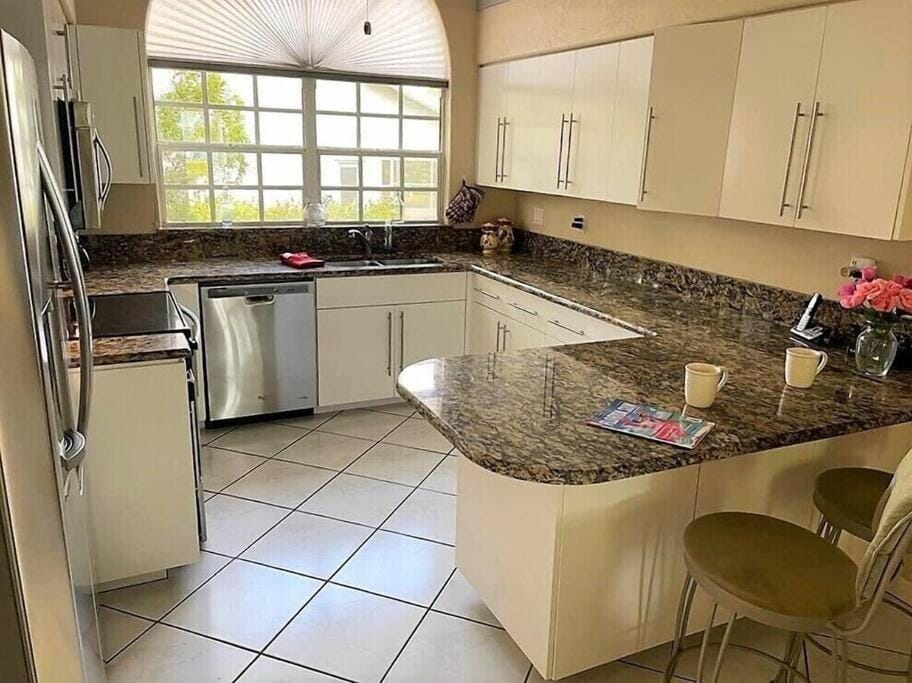 The Yellow Home amazing lake view House in Lehigh Acres