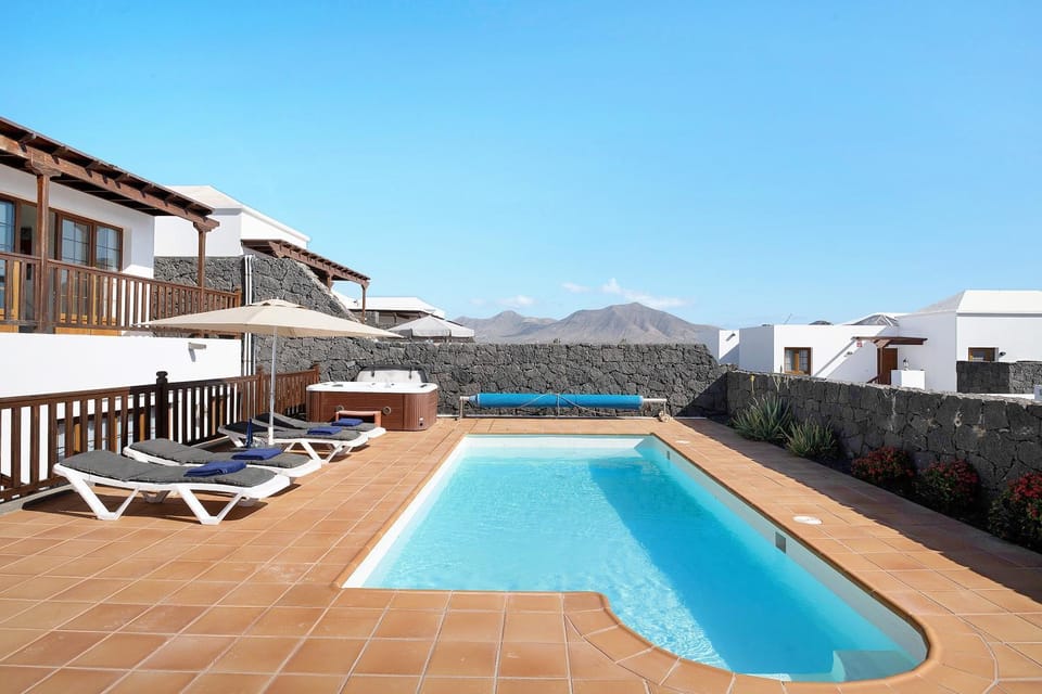 Property building, Living room, Swimming pool