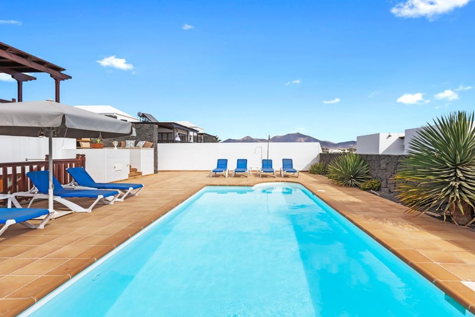 Property building, Living room, Swimming pool