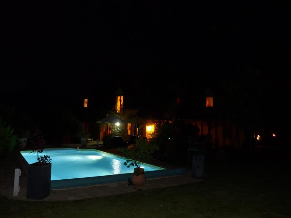Patio, Facade/entrance, Night, Summer, Swimming pool, Swimming pool