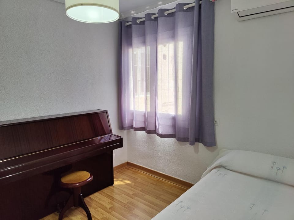 Bed, air conditioner