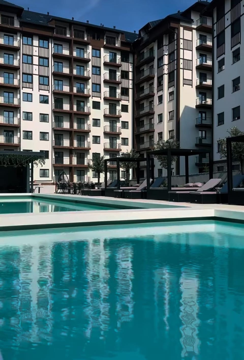 Property building, Swimming pool, Swimming pool, sunbed