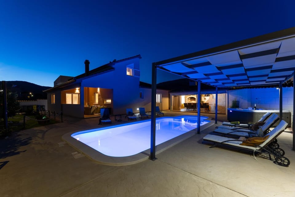 Patio, Night, Natural landscape, Pool view, Swimming pool, sunbed
