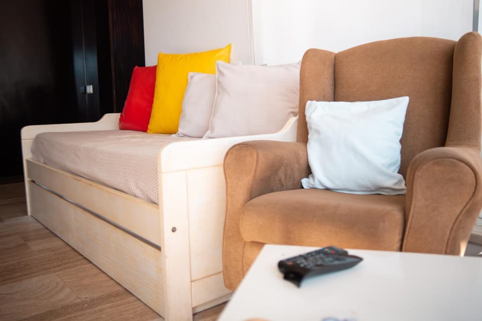 Bed, Living room, Seating area