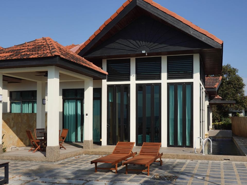 Property building, Seating area, Swimming pool, sunbed