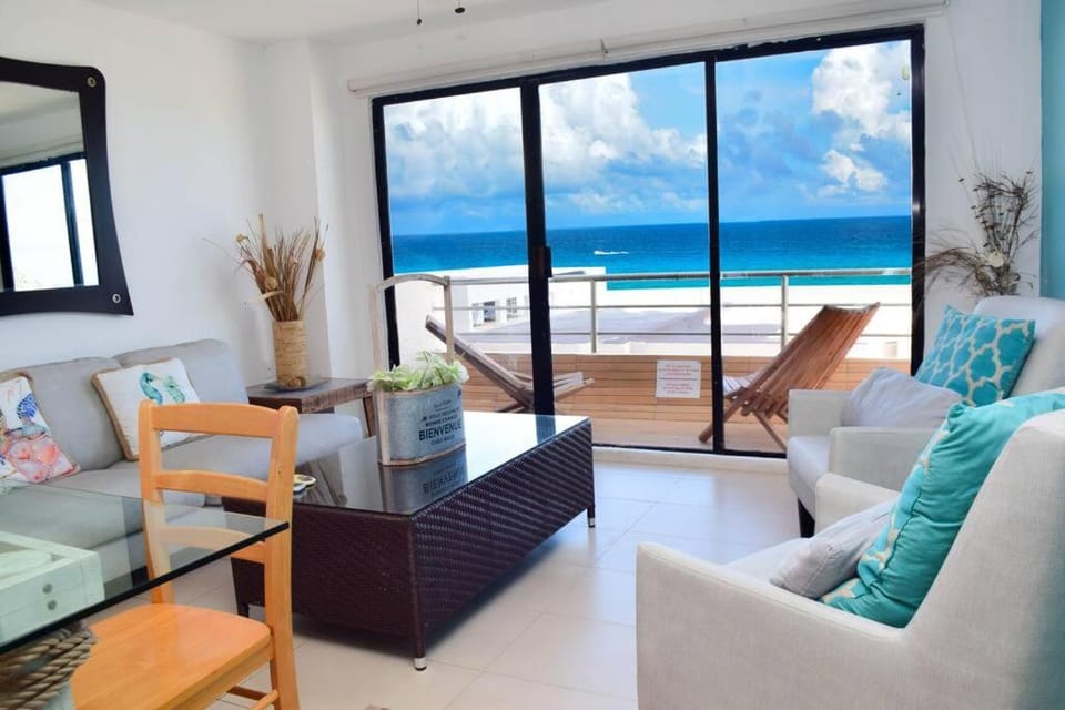 Day, Natural landscape, View (from property/room), Balcony/Terrace, Living room, Seating area, Dining area, Beach, Sea view, air conditioner