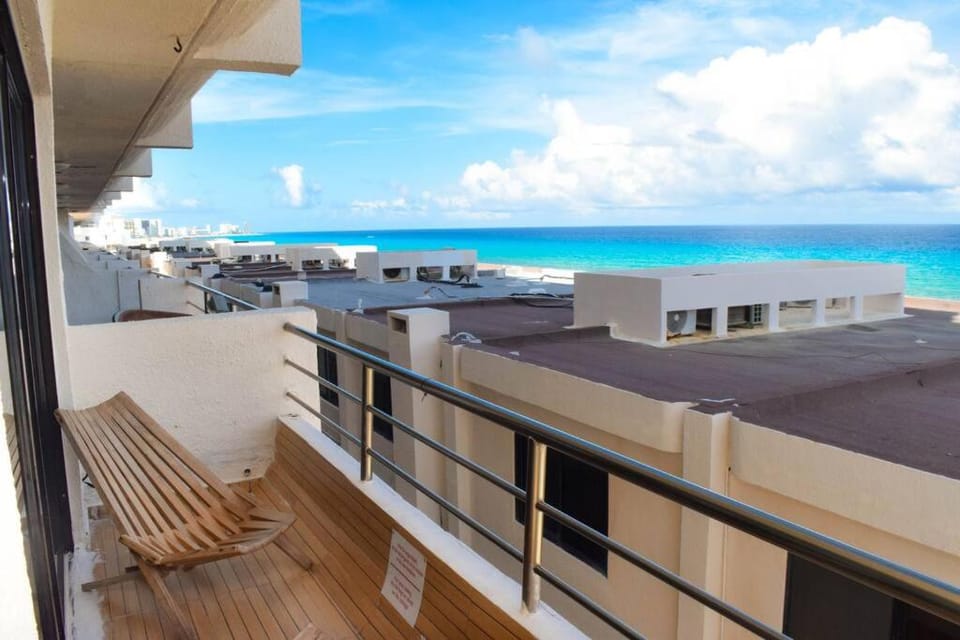 Property building, Day, Natural landscape, View (from property/room), Balcony/Terrace, Beach, River view, Sea view