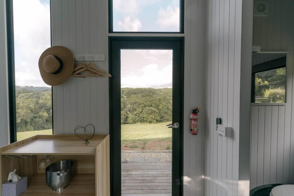 Rainforest Sunsets by Tiny Away House in Kuranda