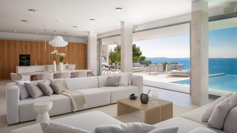 Living room, Seating area, Pool view, Sea view
