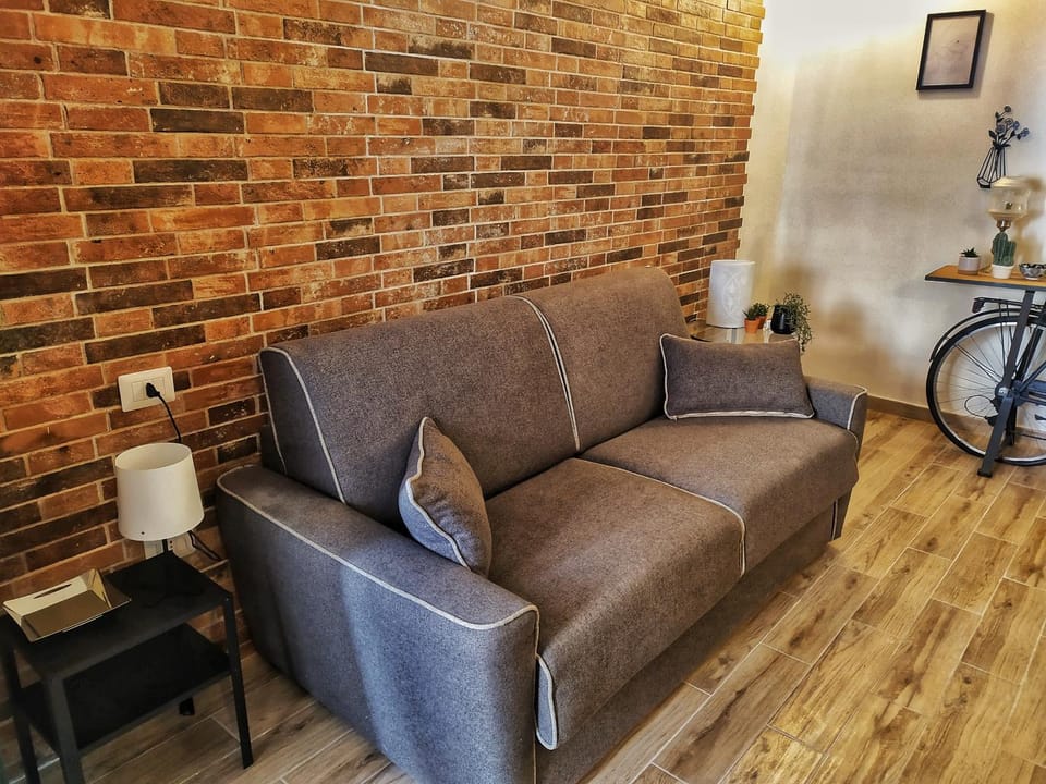 Bed, Living room, Seating area, Bedroom