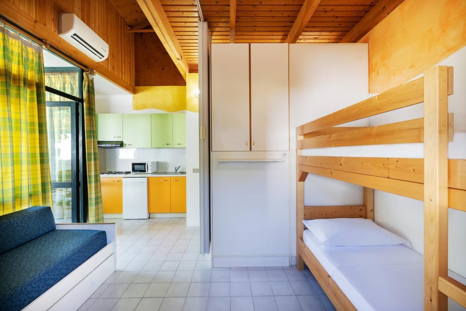 Kitchen or kitchenette, Living room, Bedroom, bunk bed, minibar, air conditioner