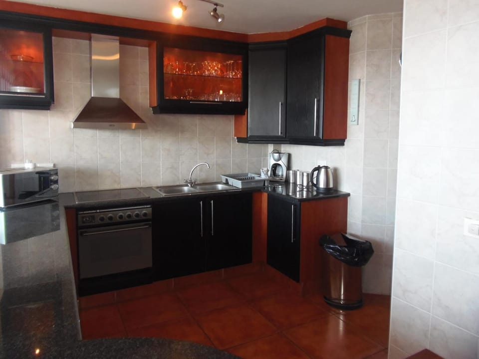 Kitchen or kitchenette, oven, stove