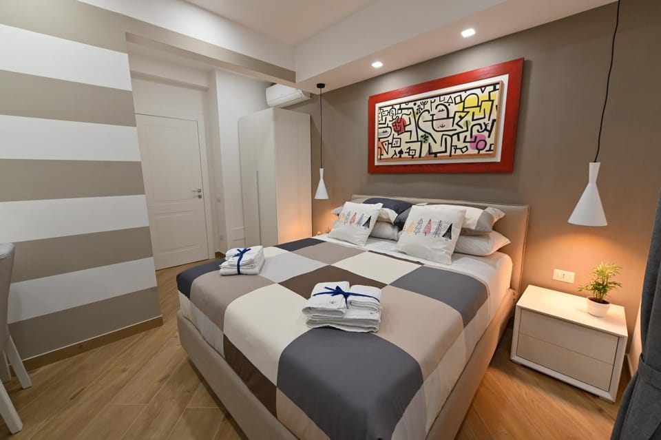 Bed, Photo of the whole room, Bedroom, towels, air conditioner